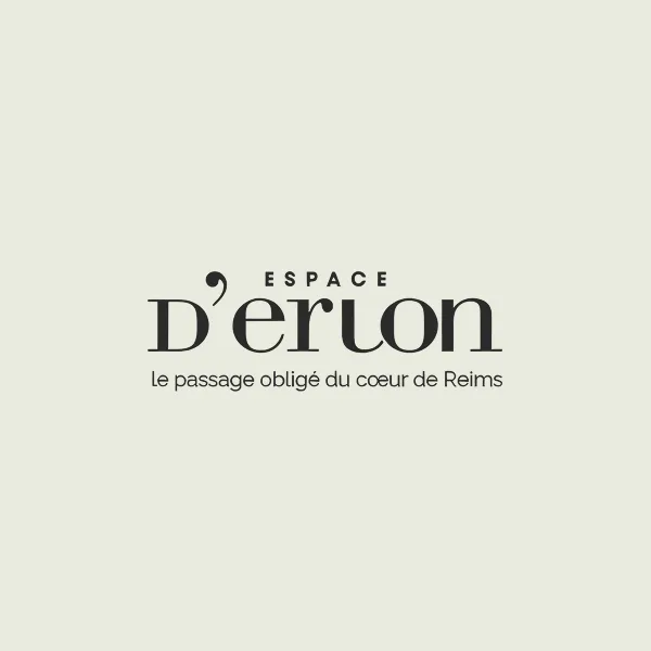 Logo Espace D'erlon avec le slogan le passage obligé du cœur de Reims.